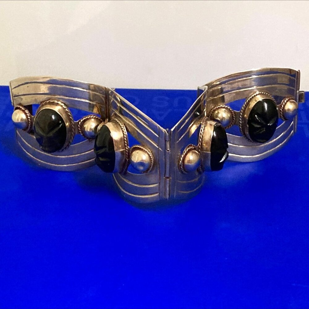 Handsome vintage Mexican mask bracelet in sterling silver & onyx